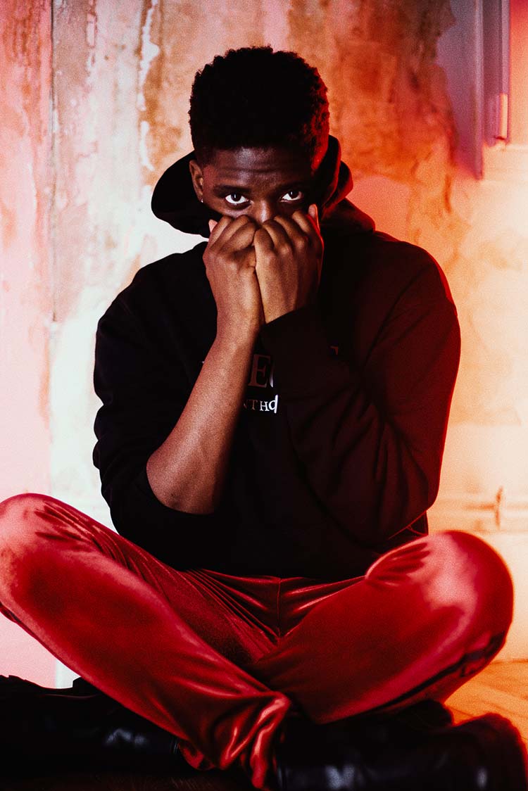 A man sitting cross-legged