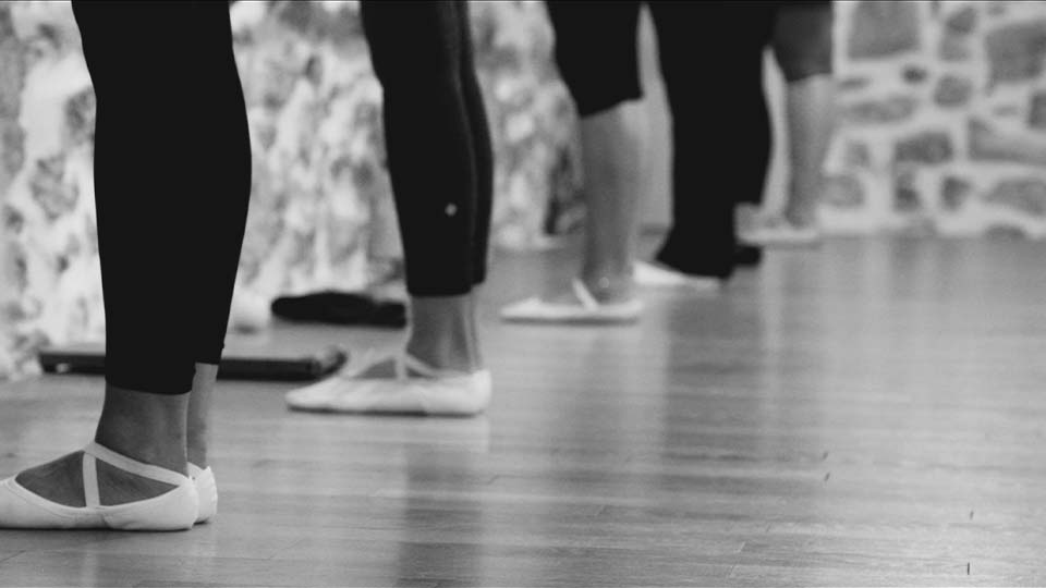 Black and white image of danser's feet